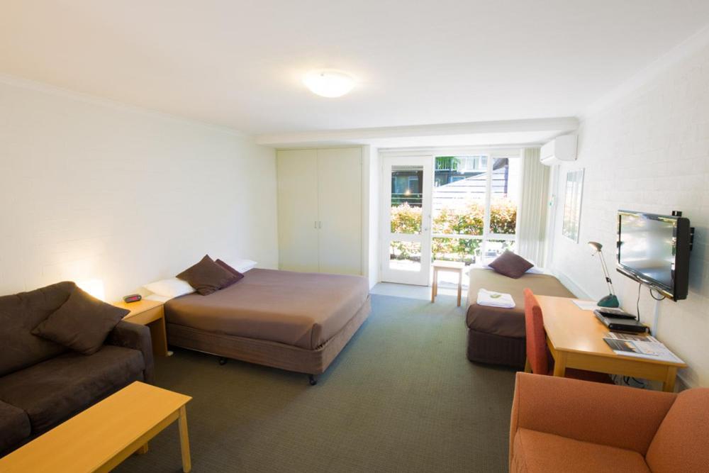 Summer East Apartments Orange Rum bild