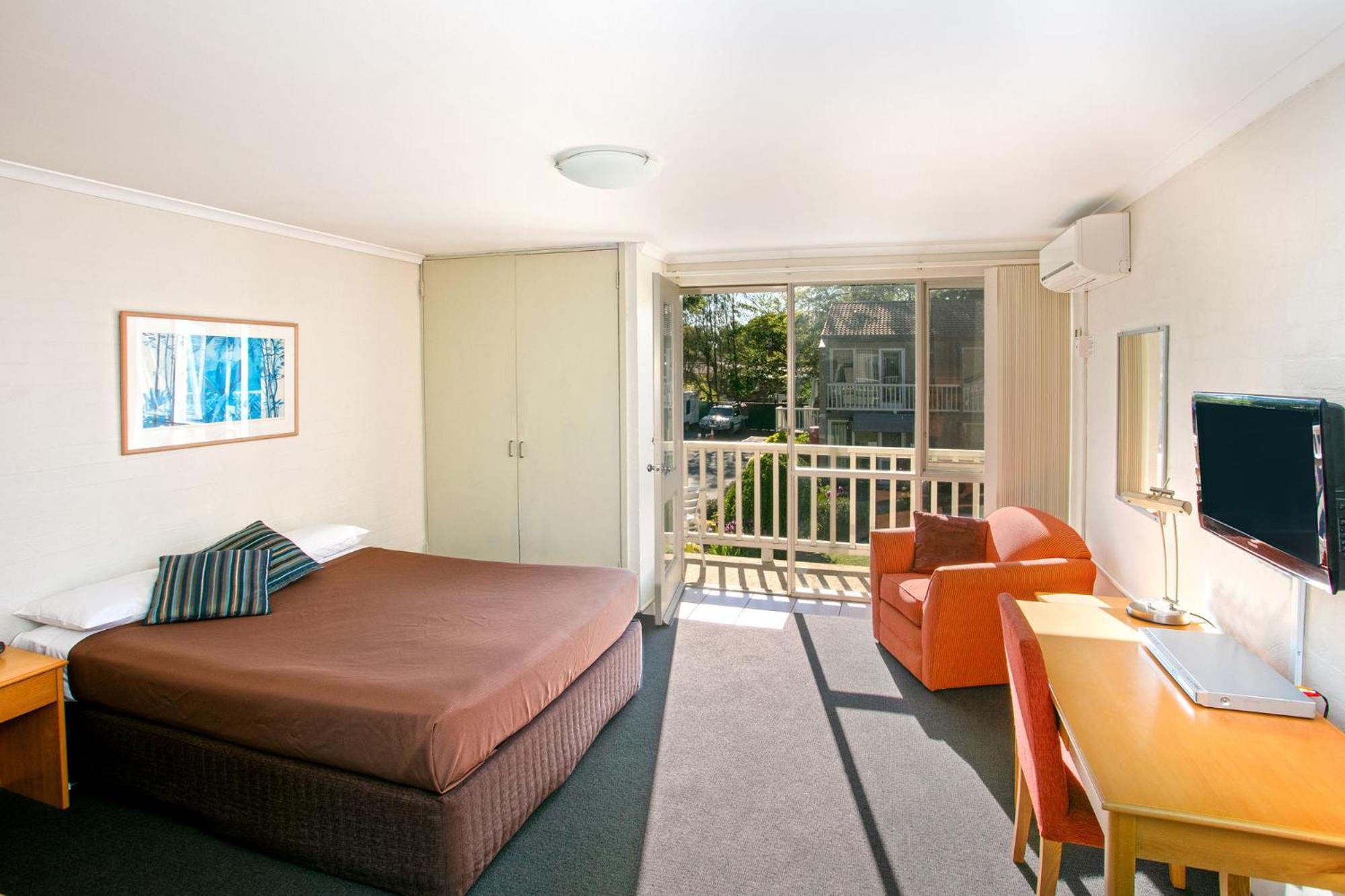 Summer East Apartments Orange Rum bild